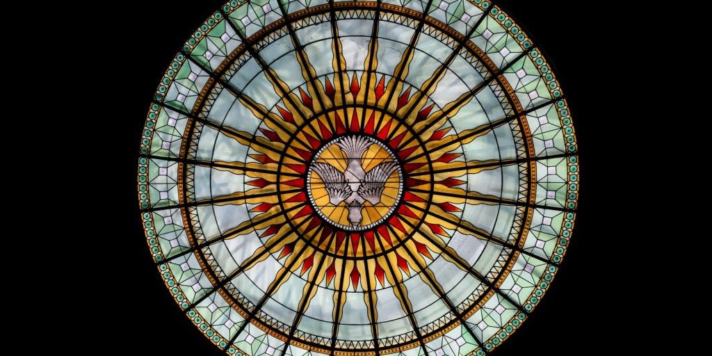 photo by thaï ch. hamelin / chokdidesign round white, beige, and red stained glass roofing